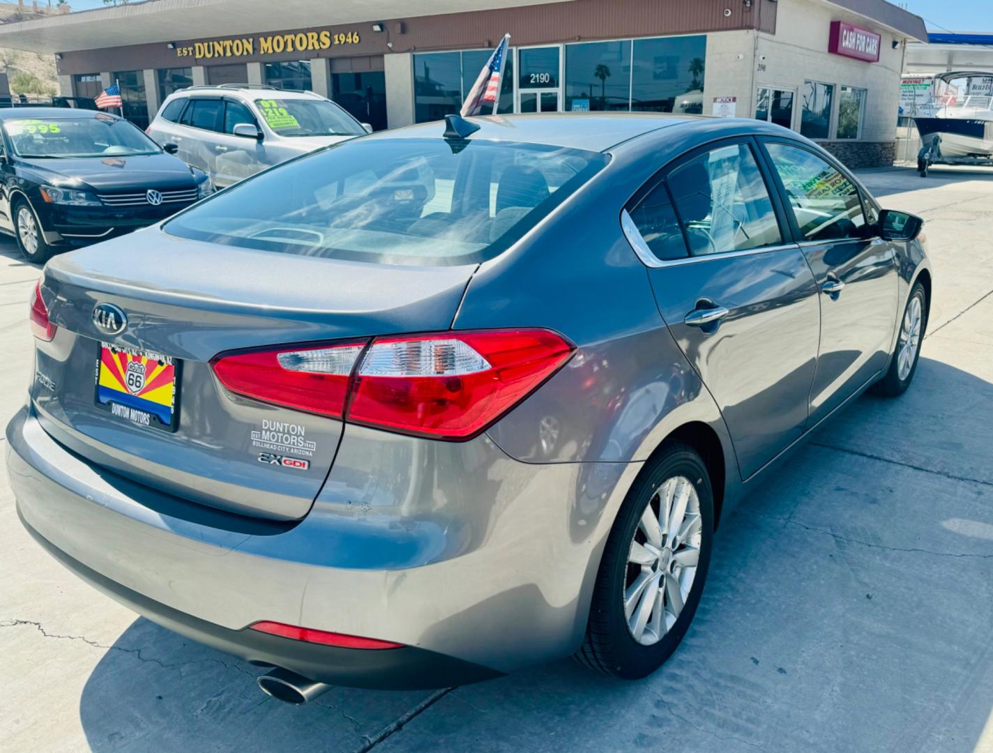 2014 grey Kia Forte (KNAFX4A86E5) , located at 2190 Hwy 95, Bullhead City, AZ, 86442, (928) 704-0060, 0.000000, 0.000000 - 2014 Kia Forte EX. 2.0 4 cylinder engine. great gas mileage. new engine with warranty. great gas mileage. brand new tires. financing available. super clean. bluetooth, backup sensors. keyless entry. satellite radio. buy here pay here. in house financing . we finance. only at Dunton Motors. - Photo#2